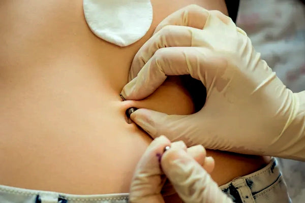 Steps to belly button piercing